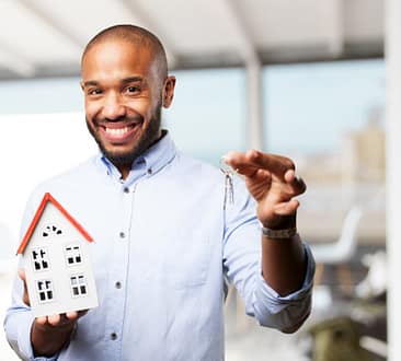 Black-businessman-happy-expression Black businessman